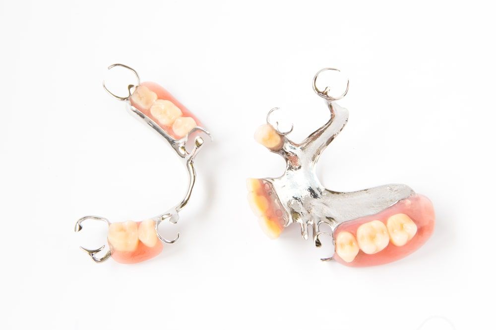 Two different partial dentures
